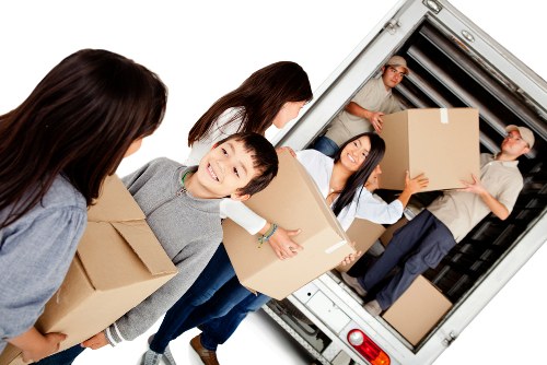 Customer complaint form and moving boxes in a removals office