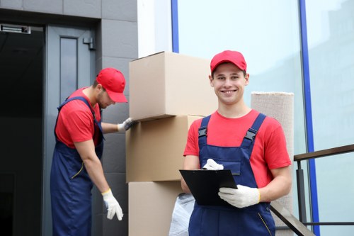 Removal team sorting reusable items for recycling in Richmond