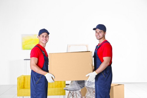 Local office moving crew handling desks and equipment in Richmond