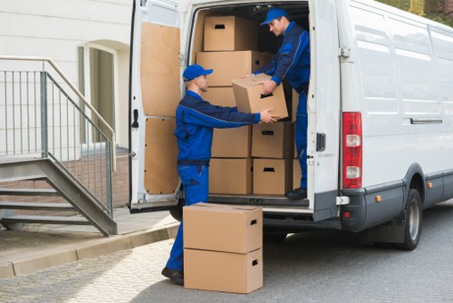 Local house removalists planning a move in Richmond street with terrace homes