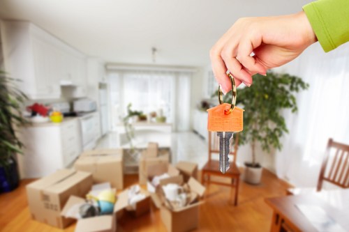 Local house removals service in Richmond with moving team and packed boxes