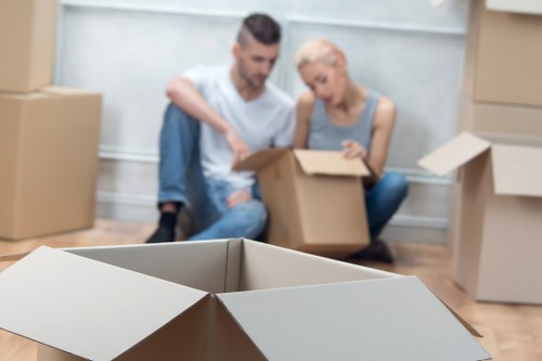 Professional movers transporting office items between Richmond premises