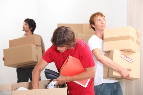 Careful handling of boxes and household items during a quick move